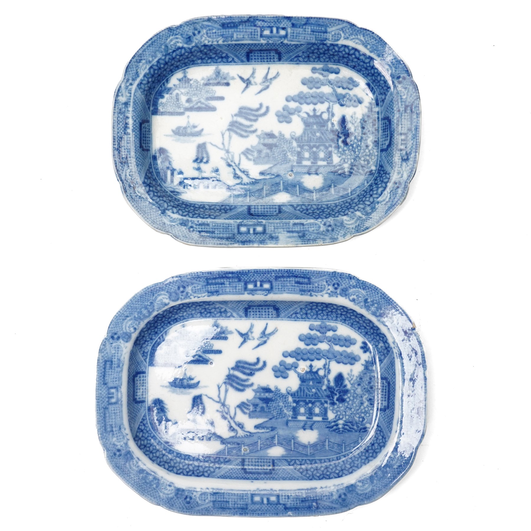 Five 19th-century willow pattern plates, two small meat platters and three plates, largest D24.2cm (5) 