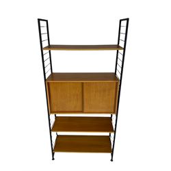 Mid-20th century Ladderax type wall unit, fitted with three shelves and cupboard with sliding doors