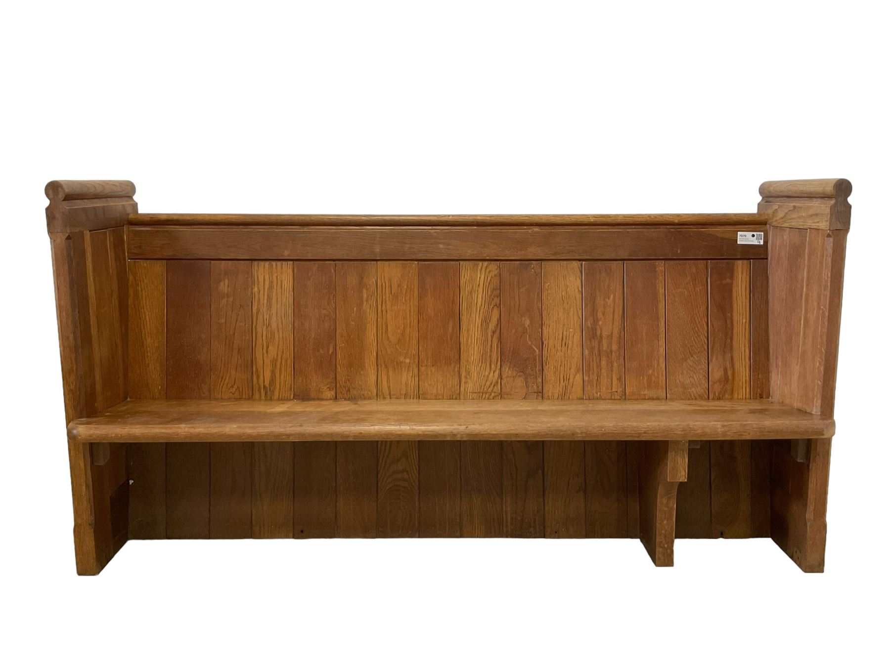 19th century oak church pew or hall bench, moulded cresting rail over panelled back and plank seat, on panelled end supports with chamfered frames