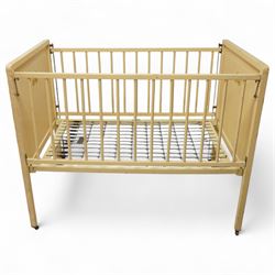 *Mid 20th century nursery set, comprising a cream painted metal cot with adjustable base, a wicker baby basket on wheeled stand, and a folding nursery screen with printed fabric panels decorated with playful animal and teddy bear motifs

Cot (H 112cm, W 136cm, D 77cm)
Screen (H 139cm, W 148cm) 
Basket (H 72cm, W 59cm, D 40cm)From the Kirkham Hall Attic & Cellar Collection, sold without reserve