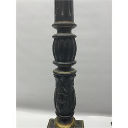 Pair of early 20th century wooden Corinthian column table lamp bases, with moulded scroll and foliate decoration, painted black with gilt detailing, upon stepped square base, one example with electric wiring, H88cm