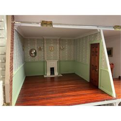 'The Hollies' - good quality sectional wooden doll's house in the form of a Georgian style four-storey bay windowed town house with simulated brick front elevation, rendered sides, off-set corner stonework, faux slate-hung top floor with flat roof and chimney stack, working sash windows, iron railings around front basement courtyard with hinged front elevation to two rooms with  spiral staircase, side hinged central section approached by external steps with iron balustrades to the sides leading to a front door, entrance hall with stairs to landing and two rooms on two floors with dado panelling and fire-surrounds, the top floor with top hung front elevation revealing stairs to a landing and bedroom; wired for electricity L51cm D65cm H107cm including chimney; together with a good quantity of quality wooden furniture and accessories including piano, dressers, bookcase and books, rugs, double half-tester bed, metalware, pictures etc