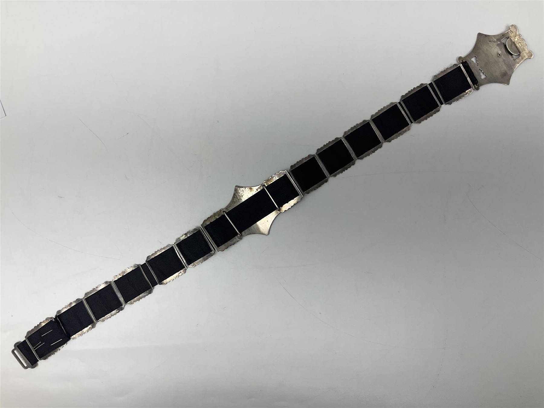 Art Nouveau silver belt, with two buckles, each depicting a female figure in profile and twelve engraved floral openwork panels, hallmarked Arthur Johnson Smith, Chester 1907, L60cm