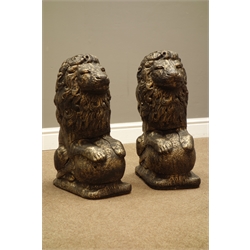  Pair antique bronze finish composite stone seated lions on spherical mounts, H57cm  