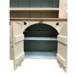 Rustic cream painted dresser, fitted with four arch top cupboards and three tier plate rack
