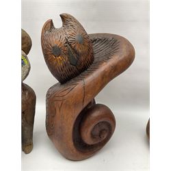 Helen Skelton (British 1933 – 2023): Three carved wooden abstract sculptures, each modelled as a cat, with carved or painted features, largest H63cm. Born into an RAF family in 1933 in Kent and travelled the world extensively during her childhood. After settling in Bridlington, Helen immersed herself in painting, textiles, and wood sculpture, often inspired by nature's beauty. Her talent was showcased in a one-woman show at Sewerby Hall and recognised with the sculpture prize at Ferens Art Gallery in 2000. Sadly, Helen’s daughter passed away from cancer in 2005. This loss inspired Helen to donate her sculptures to Marie Curie upon her passing in 2023.