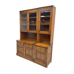 Ercol - medium elm wall display cabinet, fitted with three glaszed cupboards, three drawers and three panelled cupboards