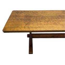 Yorkshire Oak 'Kingpost' - oak dining table, rectangular adzed top on tapered end supports, united by pegged stretchers carved with kingpost signature, on sledge feet, by Robert Ingham, Burton Leonard, Harrogate 