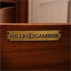 Willis & Gambier - mahogany pair of bedside cabinets, with frieze drawer with blue baize lined interior, panelled sides and three drawers raised on bracket feet