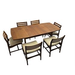 Mid 20th century teak extending dining table with additional leaf, and set six mid 20th century teak chairs with horizontal slatted back, the seat upholstered in cream patterned fabric