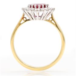 18ct gold ruby and diamond cluster ring, single pear cut ruby of approx 1.05 carat, surrounded by fourteen round brilliant cut diamonds, Birmingham 1988, total diamond weight approx 0.40 carat