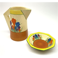 A Clarice Cliff Newport Pottery jug, decorated in the Crocus pattern, H16.5cm, together with a Clarice Cliff Bizarre by Wilkinson Limited octagonal bowl, decorated in the Crocus pattern, D13cm, each with printed marks beneath. 