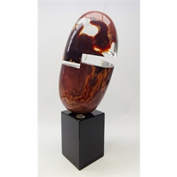  Dino Rosin (Italian 1948-): Large Murano Calcedonia glass sculpture 'Omega' raised on rectangular black glass plinth, signed with glass seal and signature, H68cm   