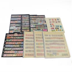 World stamps, including Uganda, Kenya, Tanganika, Hong Kong, Uganda, Japan, Malaya, South ...