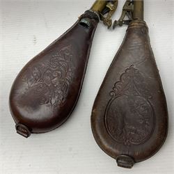 Two leather shot flasks with embossed decoration and brass nozzles; scissor action bullet mould with two ladles; pair of 19th century J.B. Warrilow hammer actions; small quantity of Staybrite buttons; and 1968 dated metal ammunition tin for 200 x 7.62 blank cartridges