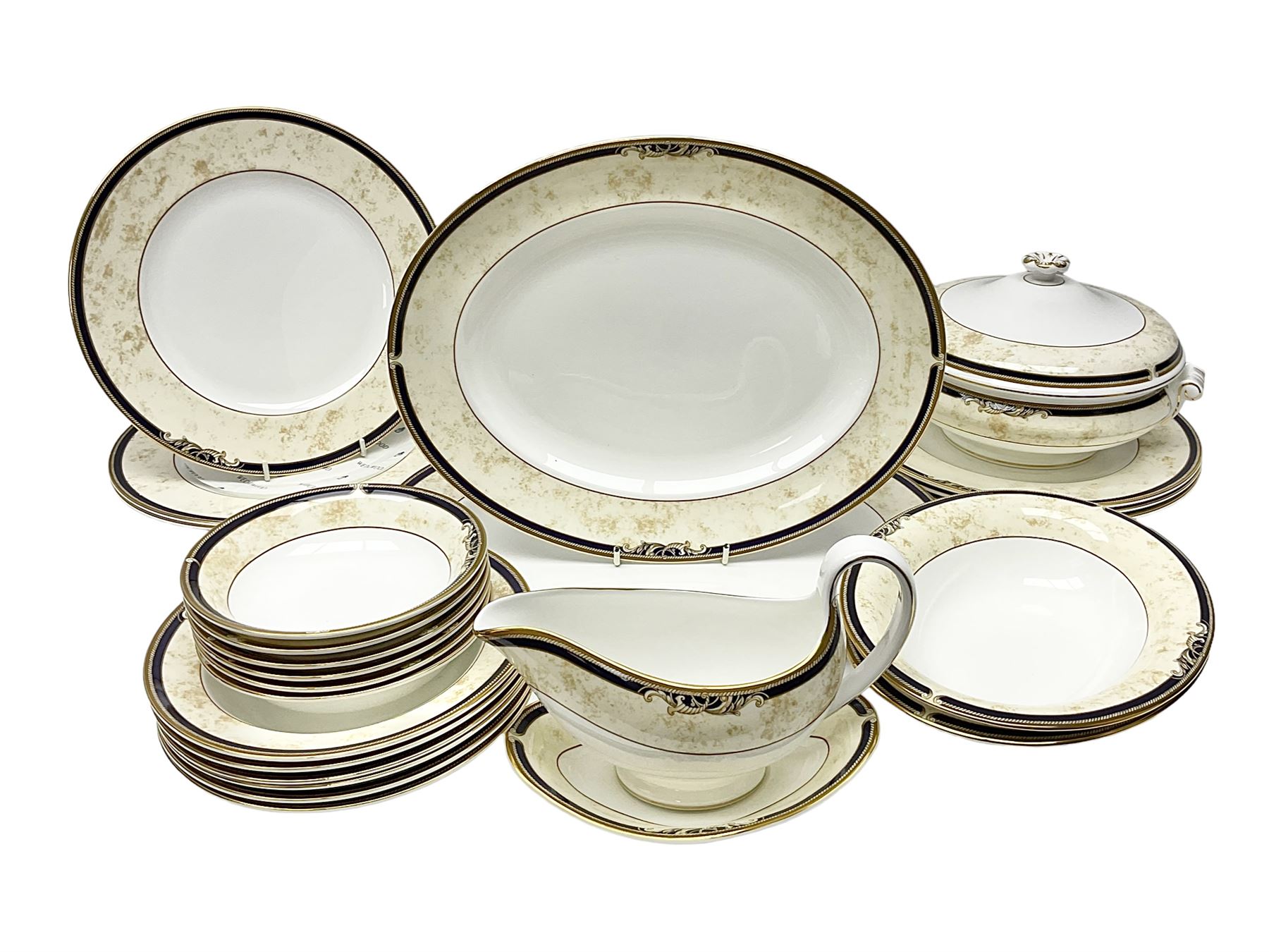 Wedgwood Cornucopia part dinner service, comprising six dinner plates, six soup bowls, six bowls, two serving platters, two oval dishes, covered serving dish, sauce boat and saucer (25)