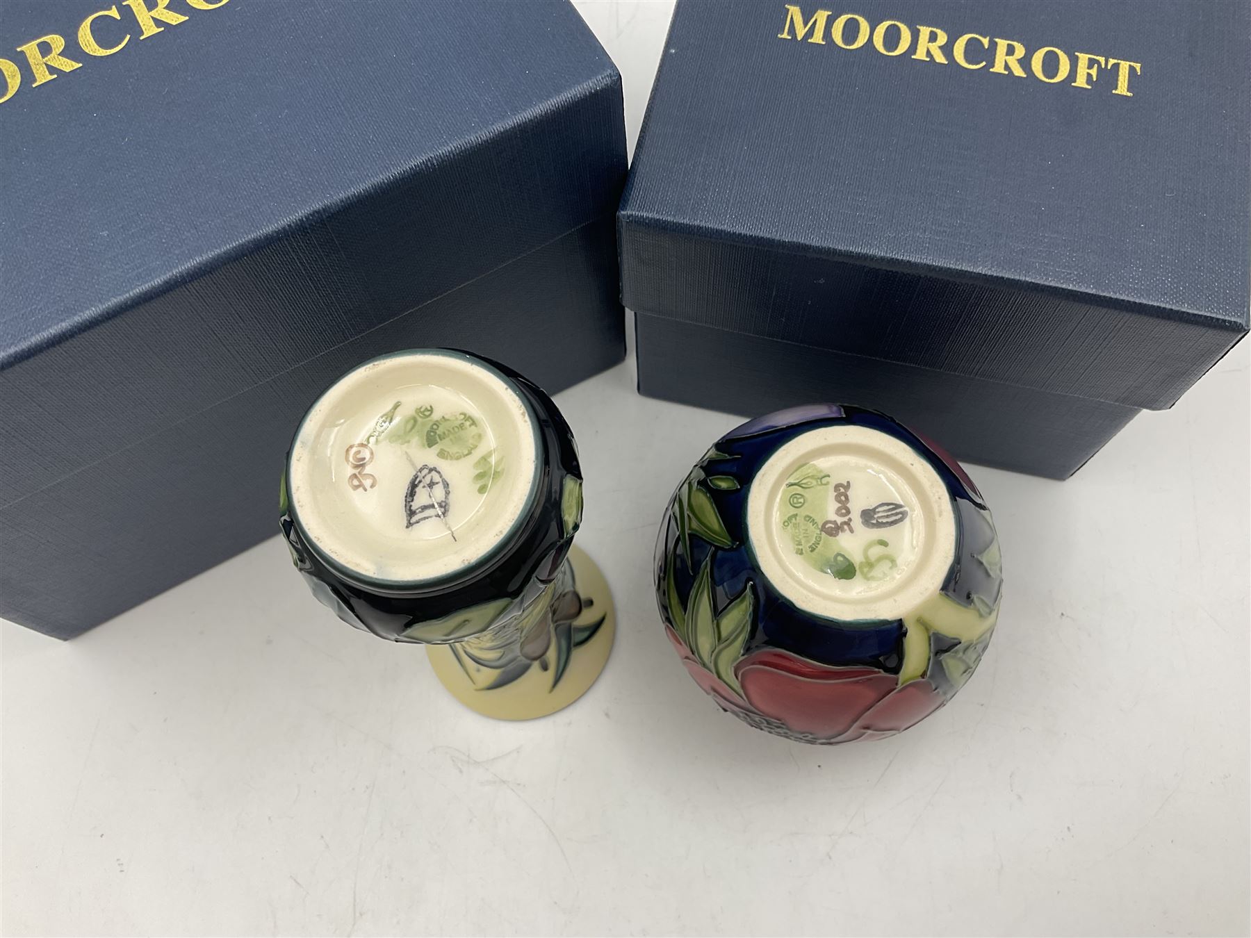 Two small Moorcroft vases, one decorated in the Lamia pattern by Rachel Bison, circa 1995, H13cm and the other in the Anemone Tribute pattern by Emma Bossons, circa 2002, H7.5cm, both with original boxes (2)