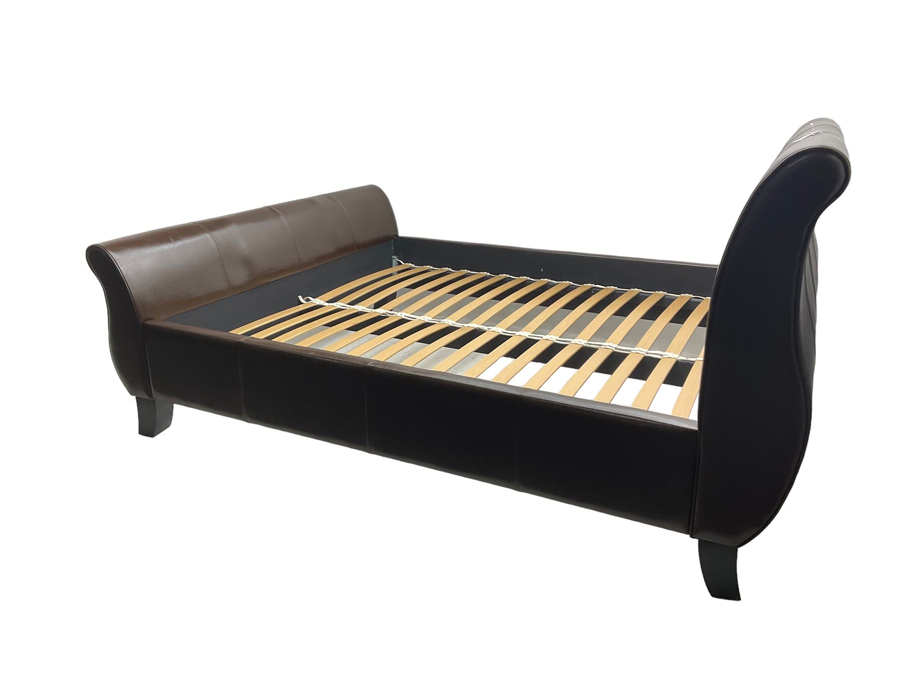 Super king 6' sleigh bed, upholstered in chocolate brown leather, with ebonised splayed feet