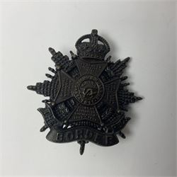 Four Border Regiment cap badges including eleventh battalion (4)