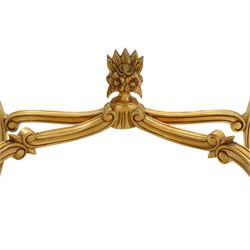 Louis XV style gold painted dressing table, serpentine top with green leather inset and mirrored back with floral garland decoration to frieze and legs, united by curved stretcher with central floral finial 