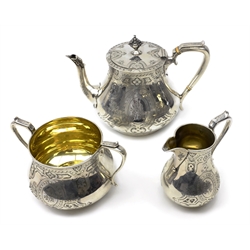  Victorian silver tea set with engraved decoration and gilt interior by Henry Holland, London 1870, approx 45oz  