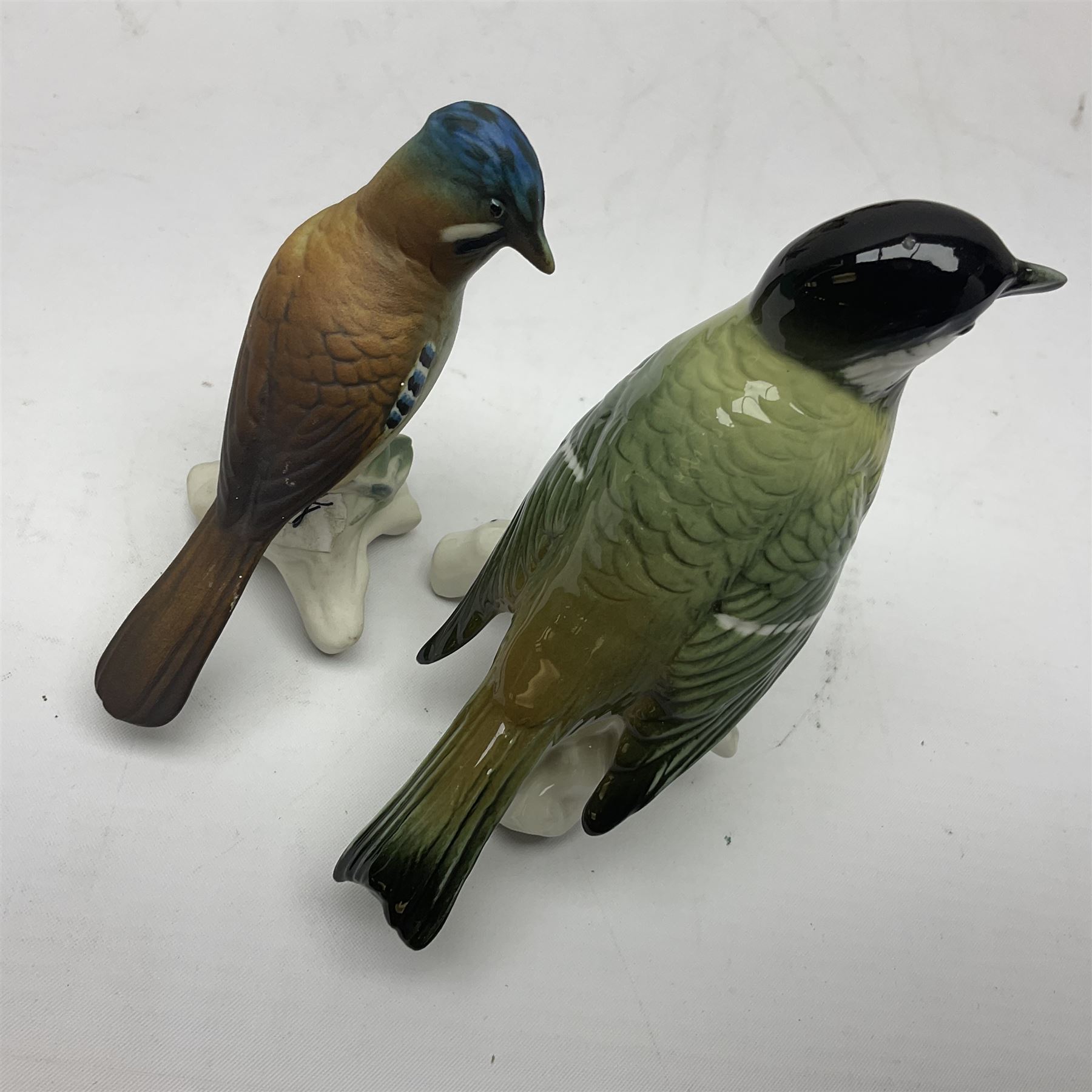 Eight Karl Ens bird figures, together with Mack blue tit and one other