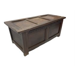 18th century oak chest or coffer, rectangular panelled hinged top, frieze carved with lunettes with reeded panel rails, raised on stile supports