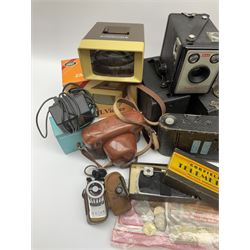 Collection of cameras, including Kodak Bantam coloursnap II, Kodak Brownie model I, Kodak instamatic, Halina 35X and three others, along with opera glasses and other items