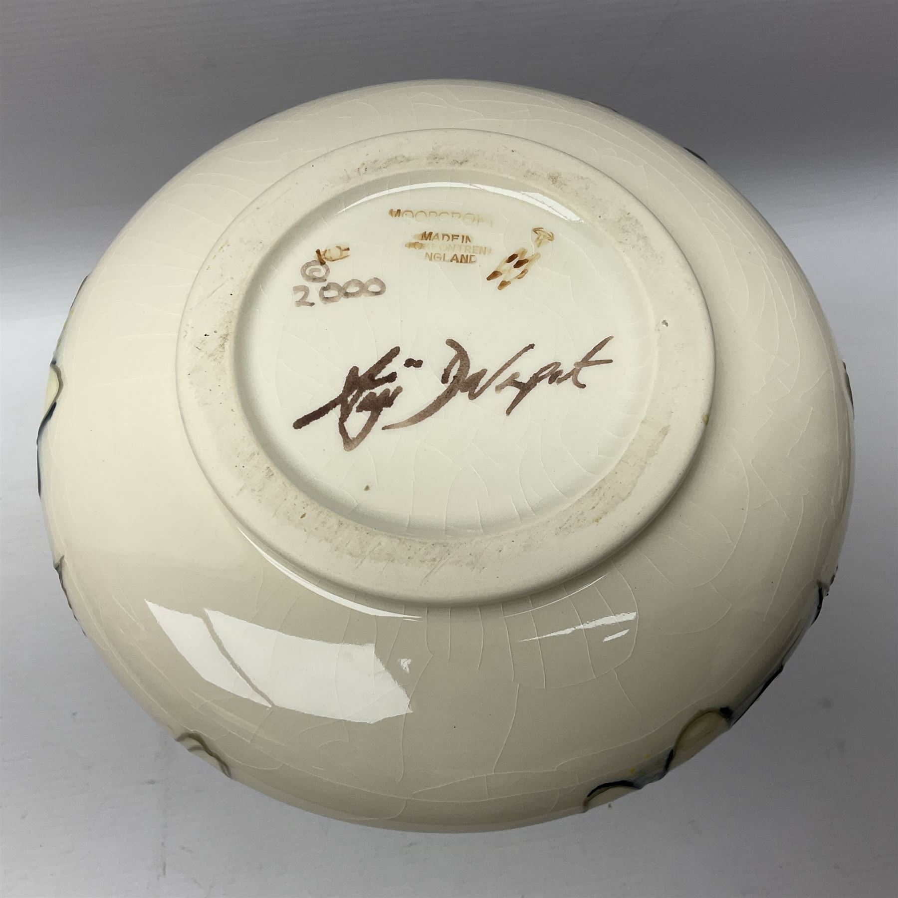 Moorcroft vase, of compressed form with a tall flared neck, decorated in the Juneberry pattern, circa 2000, H25cm