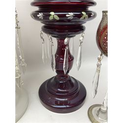 Bohemian red glass lustre, painted with stylised floral and foliate decoration, together with a milk glass example and two bohemian goblets converted to lustres 