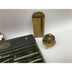 Two Victorian brass sovereign scales, one marked 'Harrison' L10cm; cased set of drawing instruments by G. Thornton Limited Manchester; Chesterman No.770/1 steel vernier caliper; two boxwood rulers; cased slide rule; brass and boxwood rope/wire gauge etc