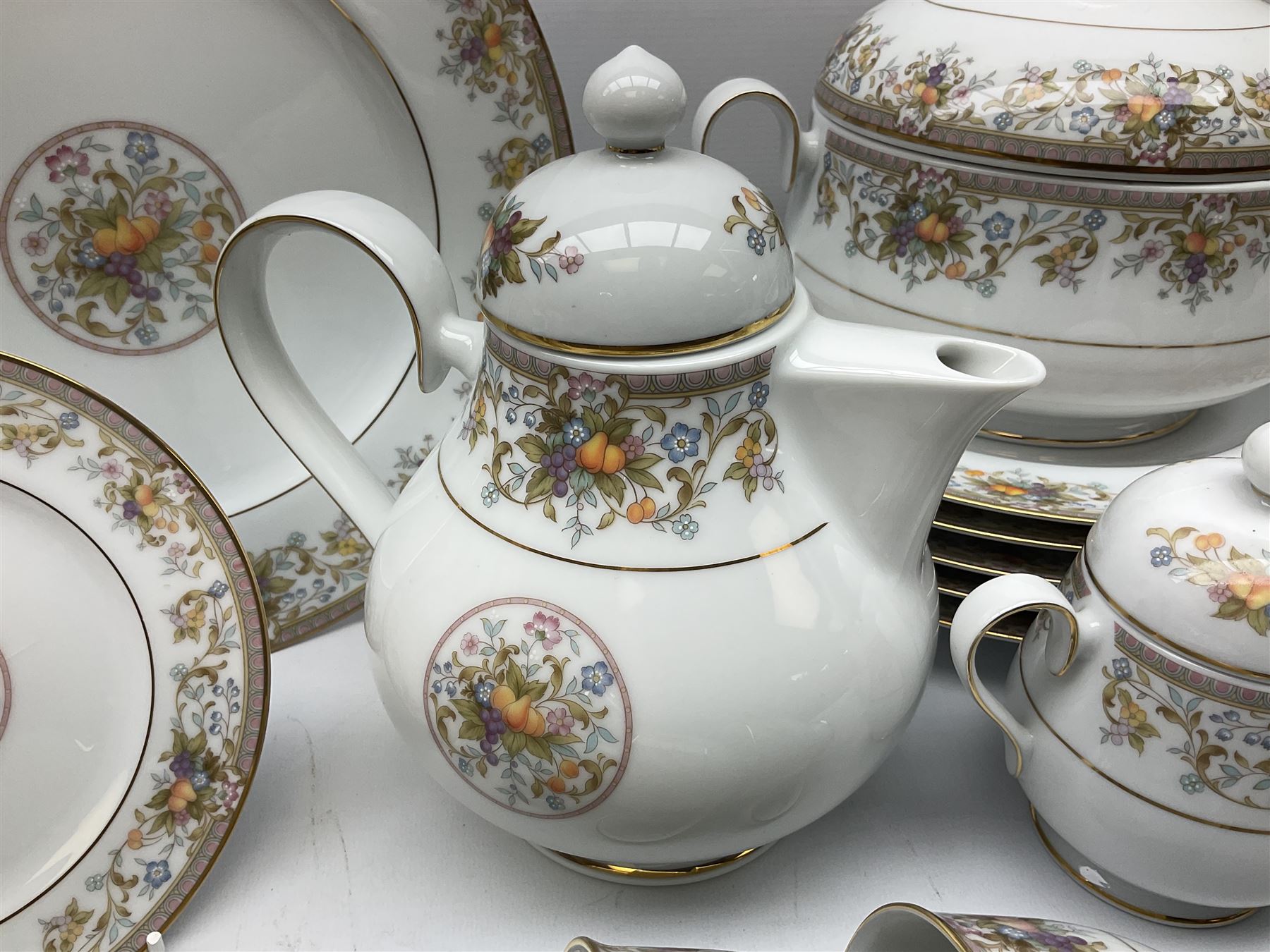 Noritake Ireland tea and dinner wears, comprising of teapot, milk jug, covered sucrier, seven teacups and saucers, seven dessert plates, six dinner plates, seven side plates, five bowls two serving dishes, one lidded tureen and a gravy boat and dish