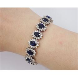 18ct white gold oval cut sapphire and round brilliant cut diamond bracelet, stamped, total sapphire weight approx 16.00 carat