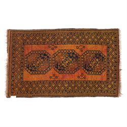 Afghan Ersari hand-knotted rug, apricot field decorated with three large octagonal gul medallions filled with geometric floral motifs, flanked by small tribal devices, end fringe fraying 97x167cm, together with a Baluch prayer rug, decorated with stylized tree motifs arranged in vertical rows beneath a stepped mihrab arch with multiple narrow borders of angular tribal motifs in shades of indigo, brown, and ochre fraying to flatweave ends, 134x84cm, (2)