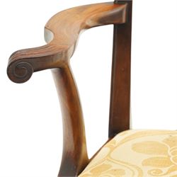 Late 19th century Chippendale style mahogany desk chair, with pierced splat and shaped and scrolled arms, raised on front claw and ball supports