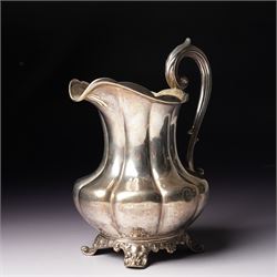 Victorian silver cream jug of panel sided baluster form with crimped rimand scroll handle on shaped supports London 1840 Maker Charles Gordon  