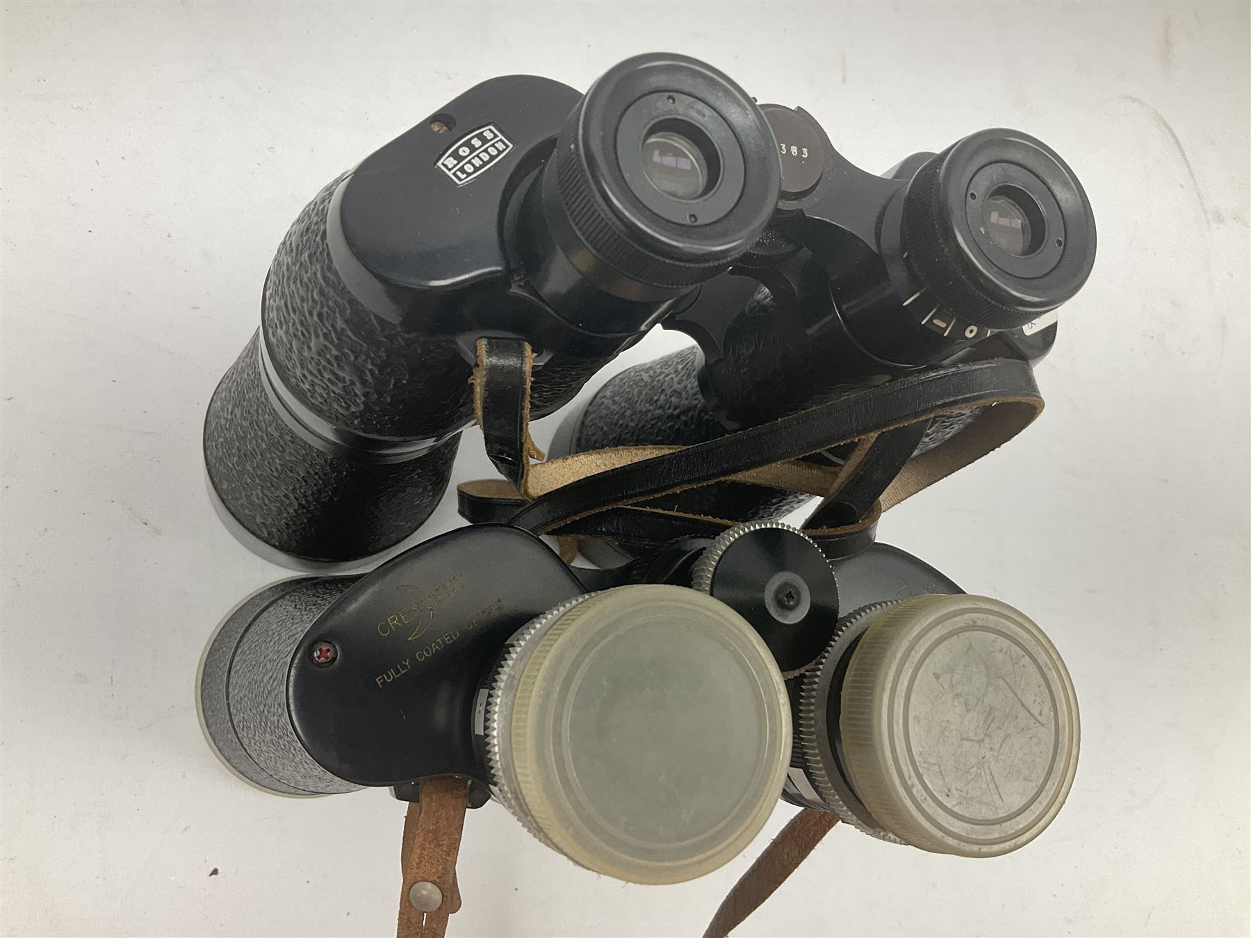 Ten cased pairs of binoculars, to include Ross London Steplux 7x50, Ross Solaross 16x60, Crescent zoom 7x- 12x50, Hilkinson 20x60,  Ross Stepnada 7x30,  Philo 10x50 etc