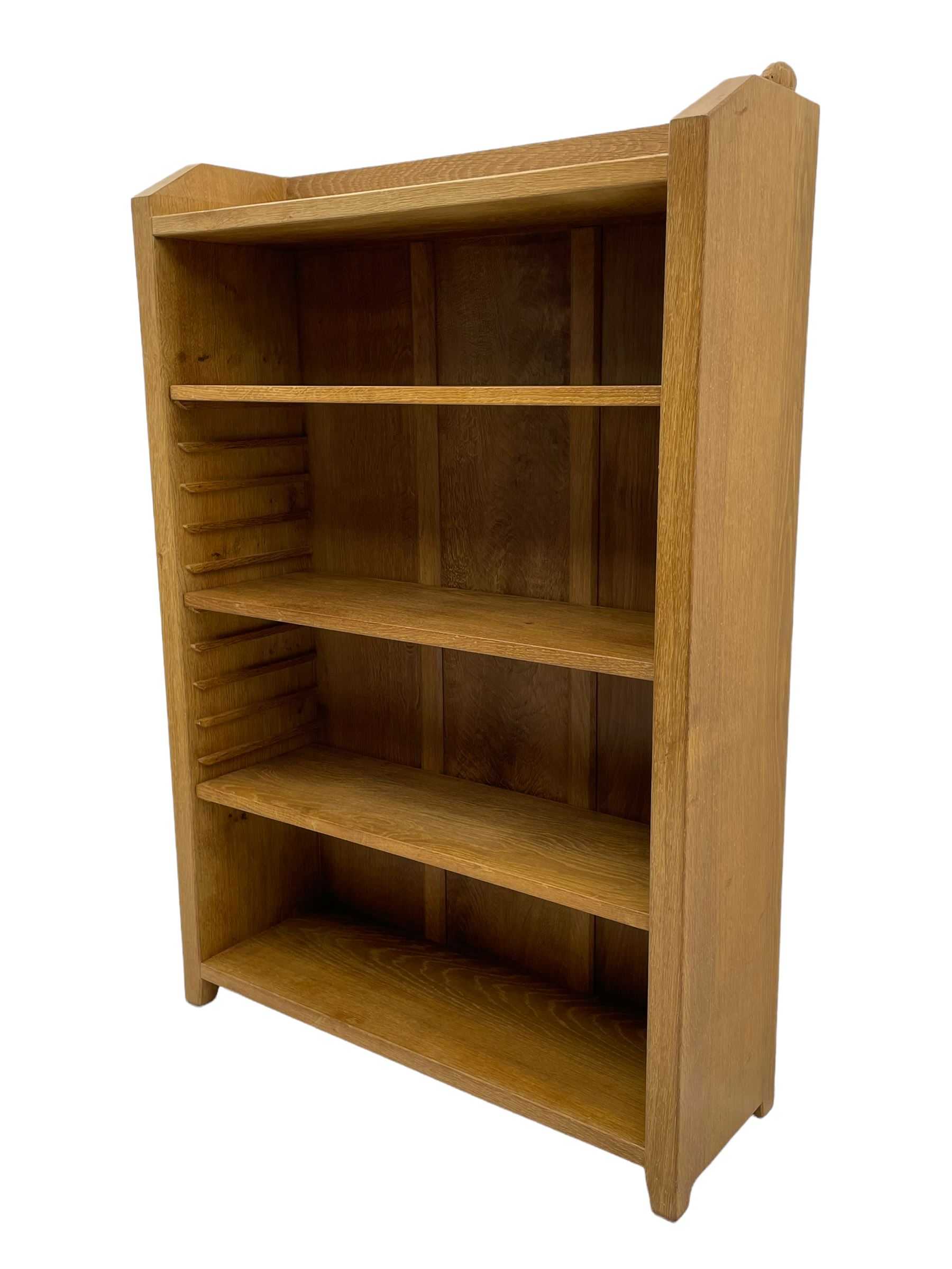'Rabbitman' oak bookcase, fitted with three adjustable shelves, the top carved with rabbit signature, by Peter Heap of Wetwang
