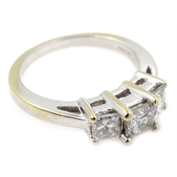  White gold three stone princess cut diamond ring, hallmarked 18ct  