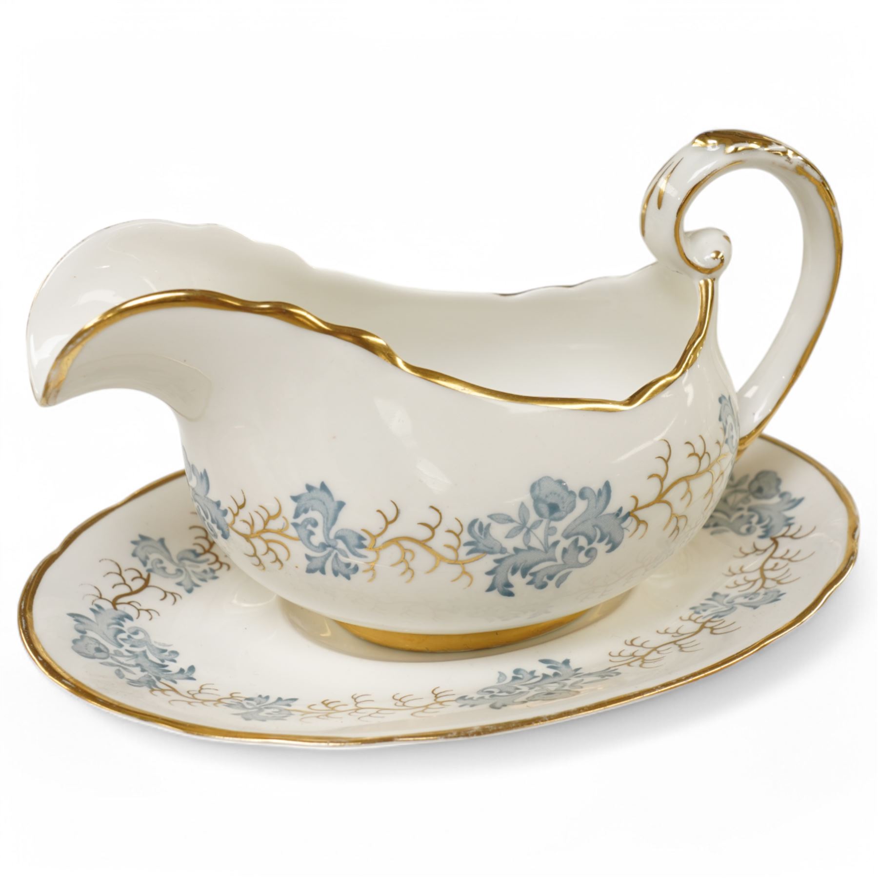 Tuscan Avondale dinner and coffee service for twelve covers with a blue and gilt border pattern comprising  twelve dinner plates, twelve dessert plates, twelve side plates, twelve two handled soup bowls and stands, four vegetable dishes and covers,  four graduated meat plates, sauce boat and stand, twelve coffee cups and saucers and twelve tea plates (106)