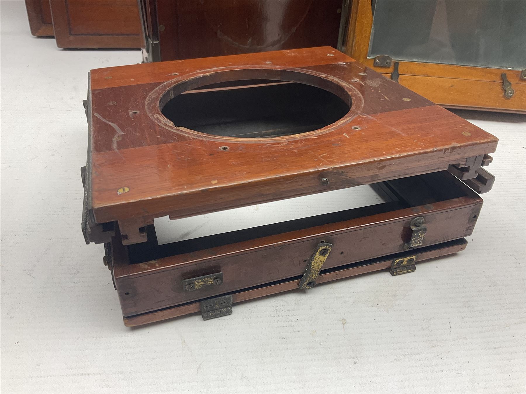 Collation of folding plate cameras of various sizes folding plate in mahogany and lacquered brass, together with camera plates and slides
By vendors repute some slide are from the Gandolfi workshop