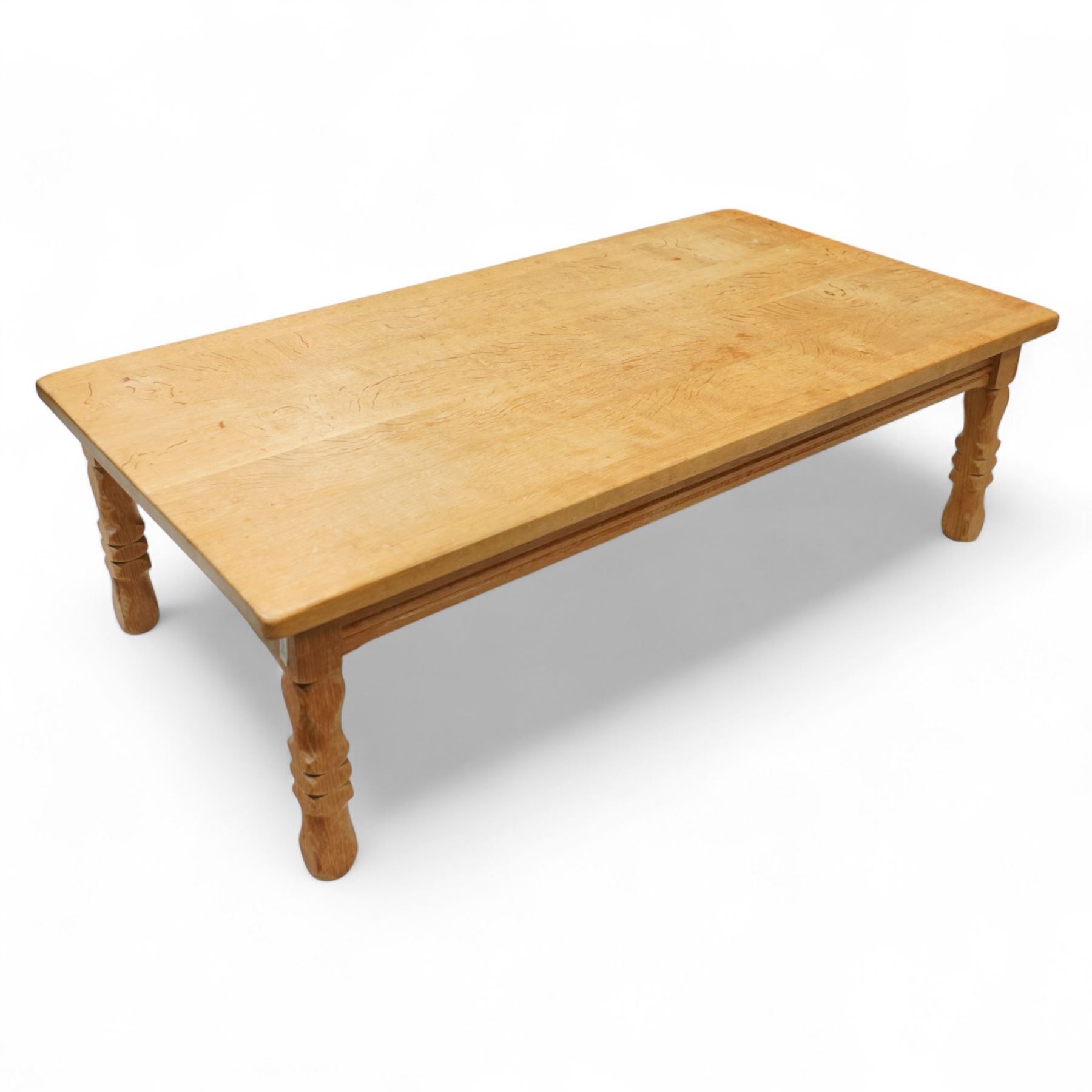 Mid-20th century light oak coffee table, retailed by Danish Homestores, Nottingham, rectangular top with prominent grain figuring, raised on turned supports