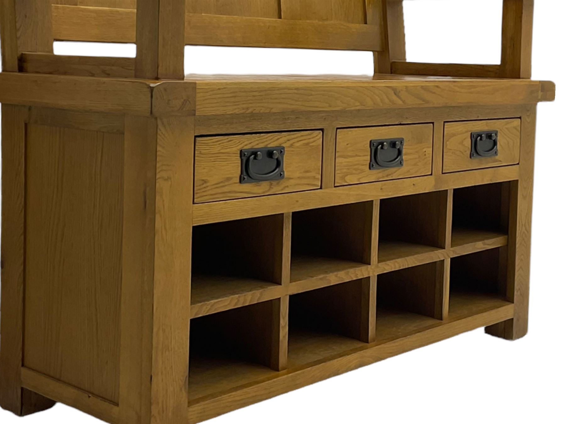 Light oak hall bench, tripled panelled back, fitted with drawers and shoe holes