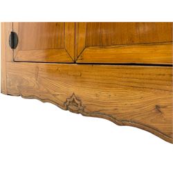 20th century Chinese elm sideboard, fitted with four drawers and four cupboards