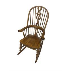 Beech Windsor rocking armchair, hoop and stick back with shaped pierced splat, dished seat, on turned supports with double H stretcher 