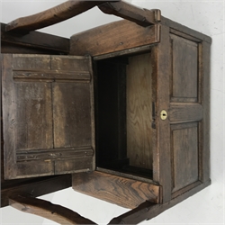 18th century oak box seat settle, panelled back, cresting rail initialled 'T.I', the moulded seat with hinged lid, down swept arms on octagonal faceted supports, fielded panelled base, engraved brass escutcheon initialled again 'T.I', W80cm, H149cm, D59cm