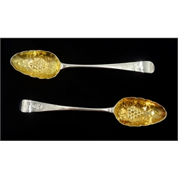 Pair of George III silver berry spoons with later embossed gilded bowls by Peter & Ann Bateman, London 1792, approx 3.5oz
