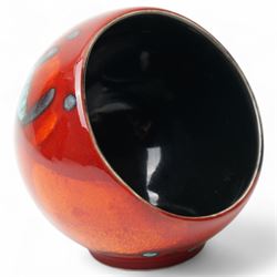 Four Poole pottery 'Volcano' pattern items comprising charger D40cm, pitcher H31cm, ginger jar and cover and salt pot (4)