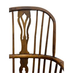 19th century elm, beech and yew wood Windsor armchair, stick back with shaped and pierced splat, turned supports with crinoline stretcher