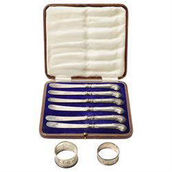  Two silver napkin rings and cased set of six silver handled pastry knives